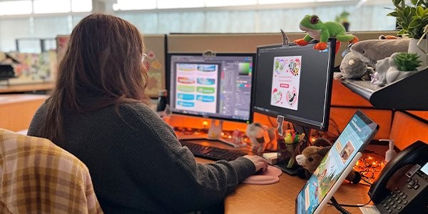 Dori designing at her desk